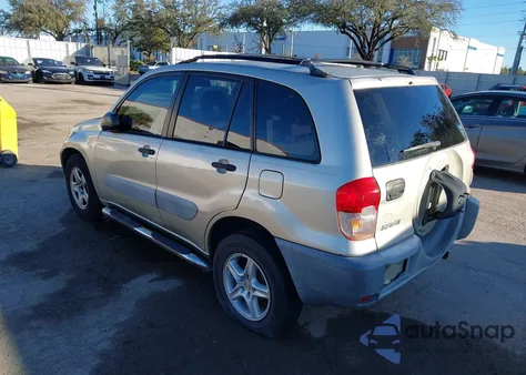 2001 Toyota Rav4 из США, поврежденный, VIN JTEGH20V910020453